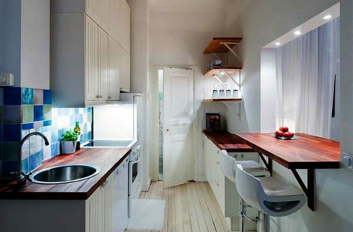 Дизайн узкой кухни с окном