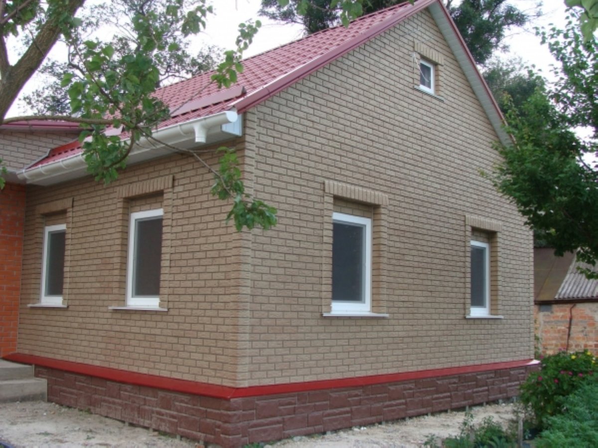 Облицовка дома фасадными панелями